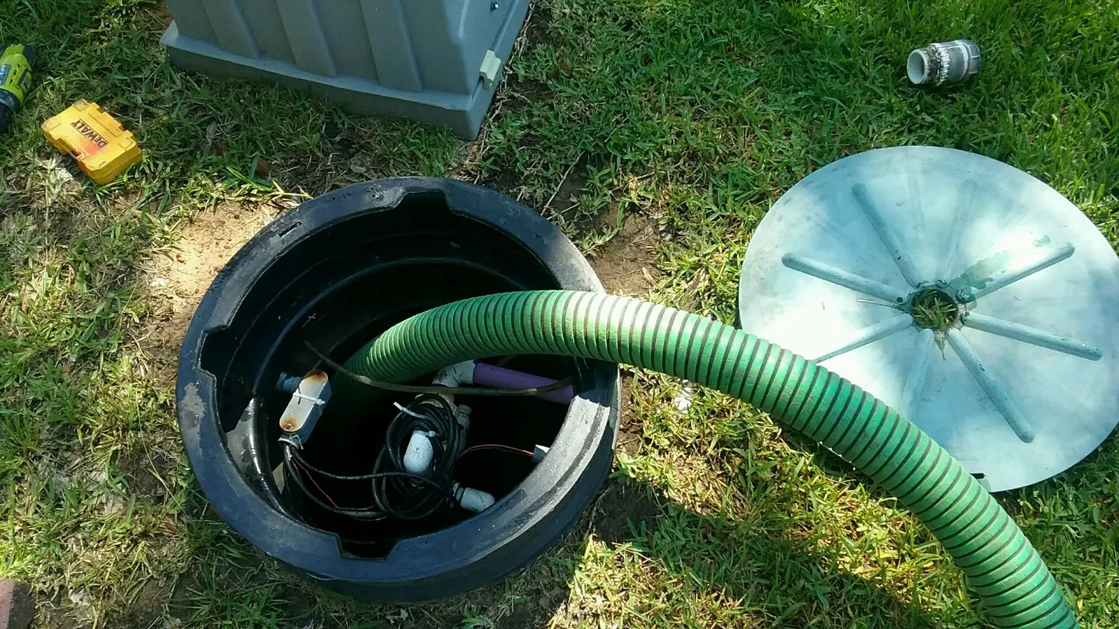 Septic pump inside an open riser